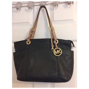 Michael Kors Women’s Medium Black Leather Tote.
